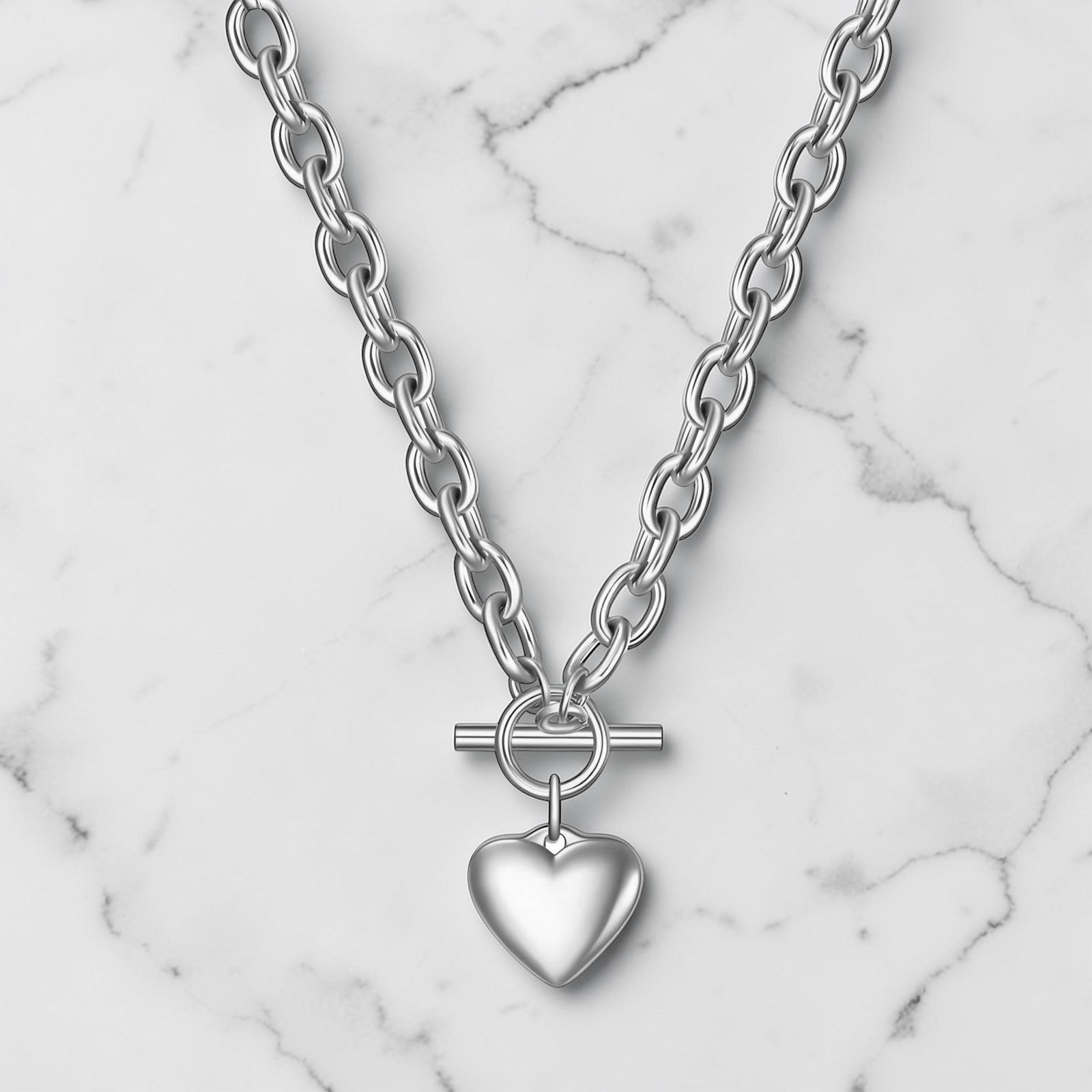 Silver heart pendant necklace with toggle clasp and chain design by Rayka & Co.