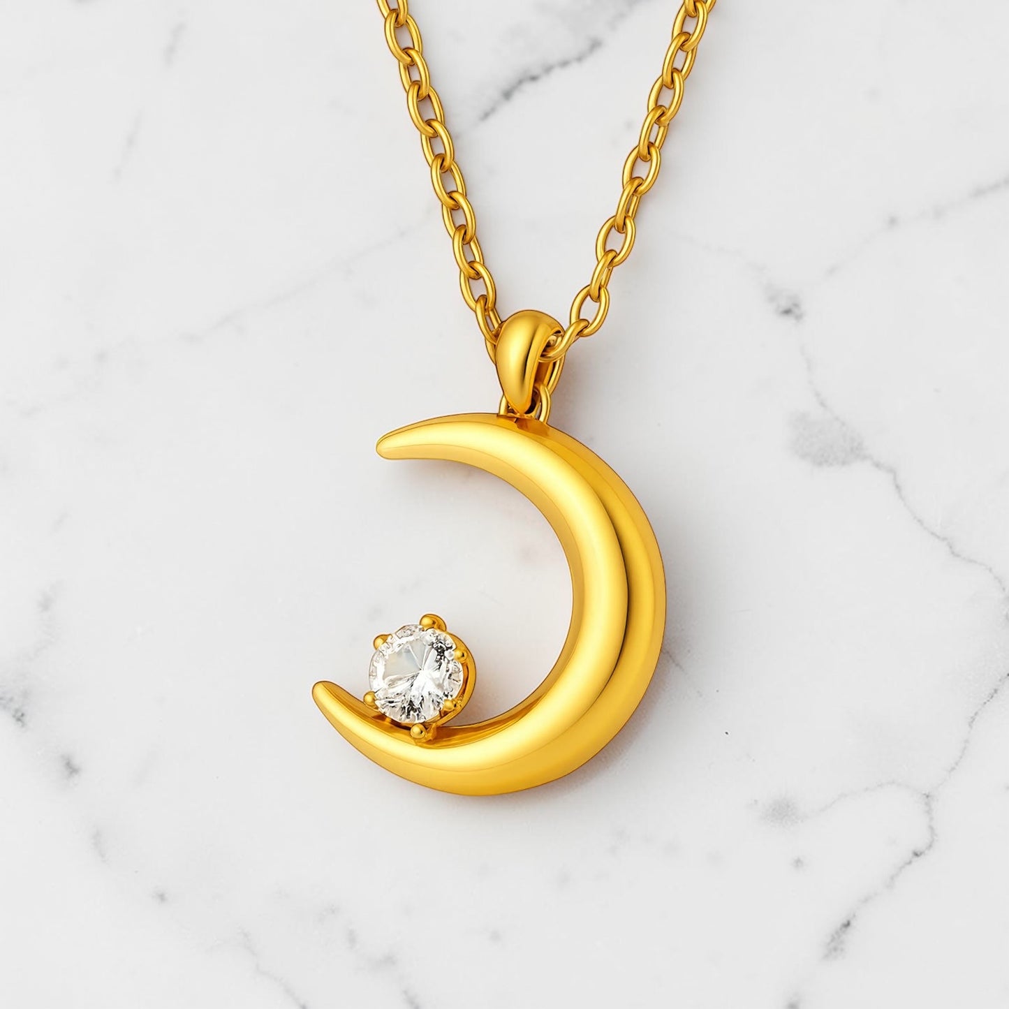Gold crescent moon necklace with cubic zirconia pendant