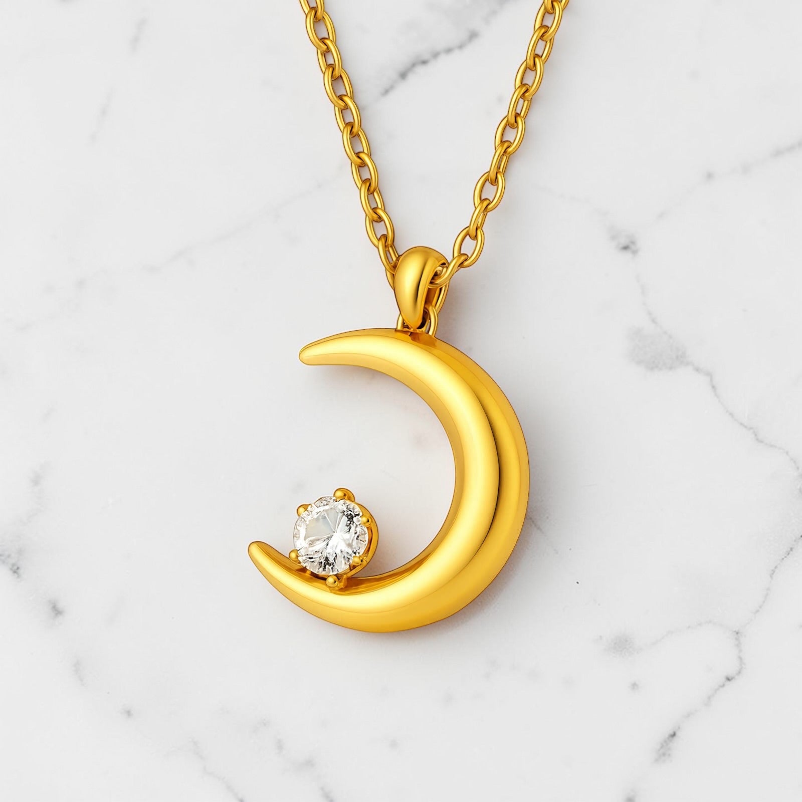 Gold crescent moon necklace with cubic zirconia pendant