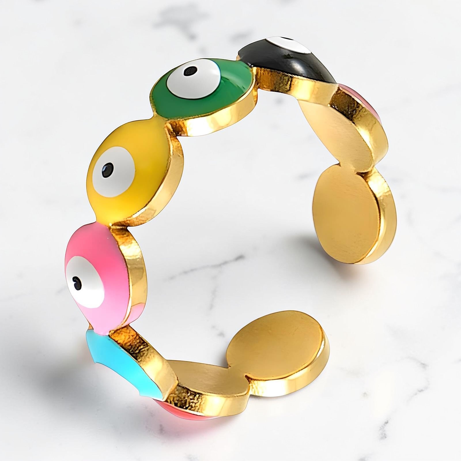 Gold-toned open ring with multi-colour enamel eye motifs and polished finish