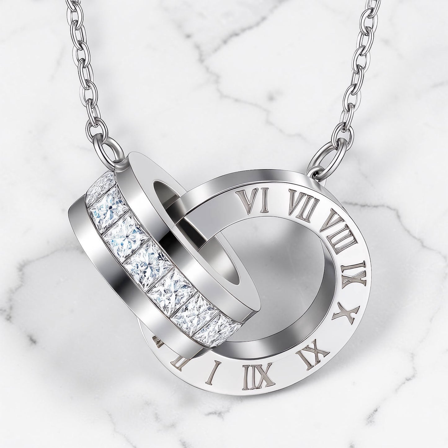Silver stainless steel necklace with interlocking circular pendants and crystal accents engraved with Roman numerals