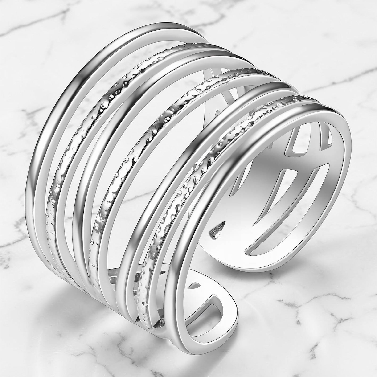Silver stainless steel open-wrap ring with layered sculptural design