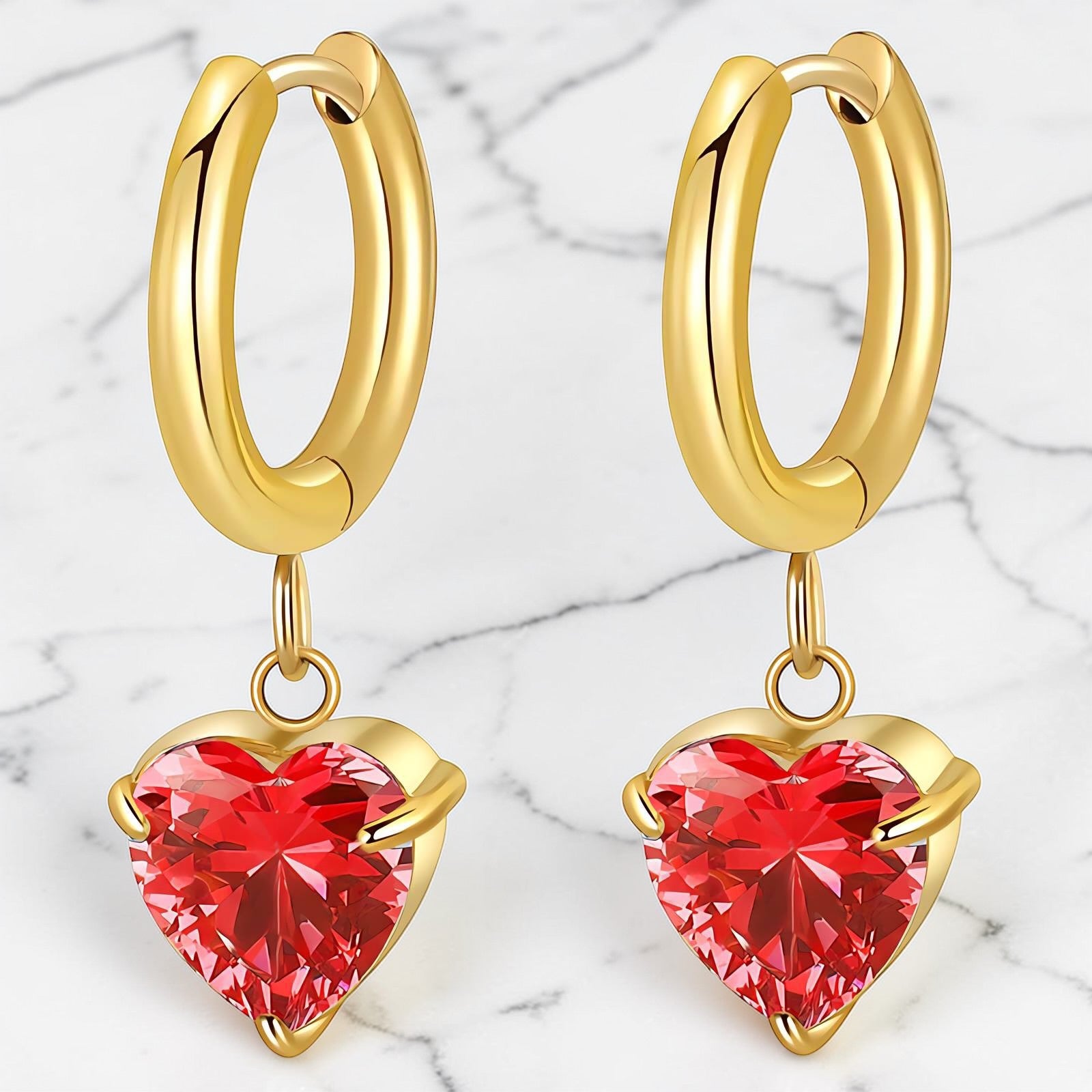 Gold huggie earrings with scarlet red heart crystal drop by Rayka & Co.