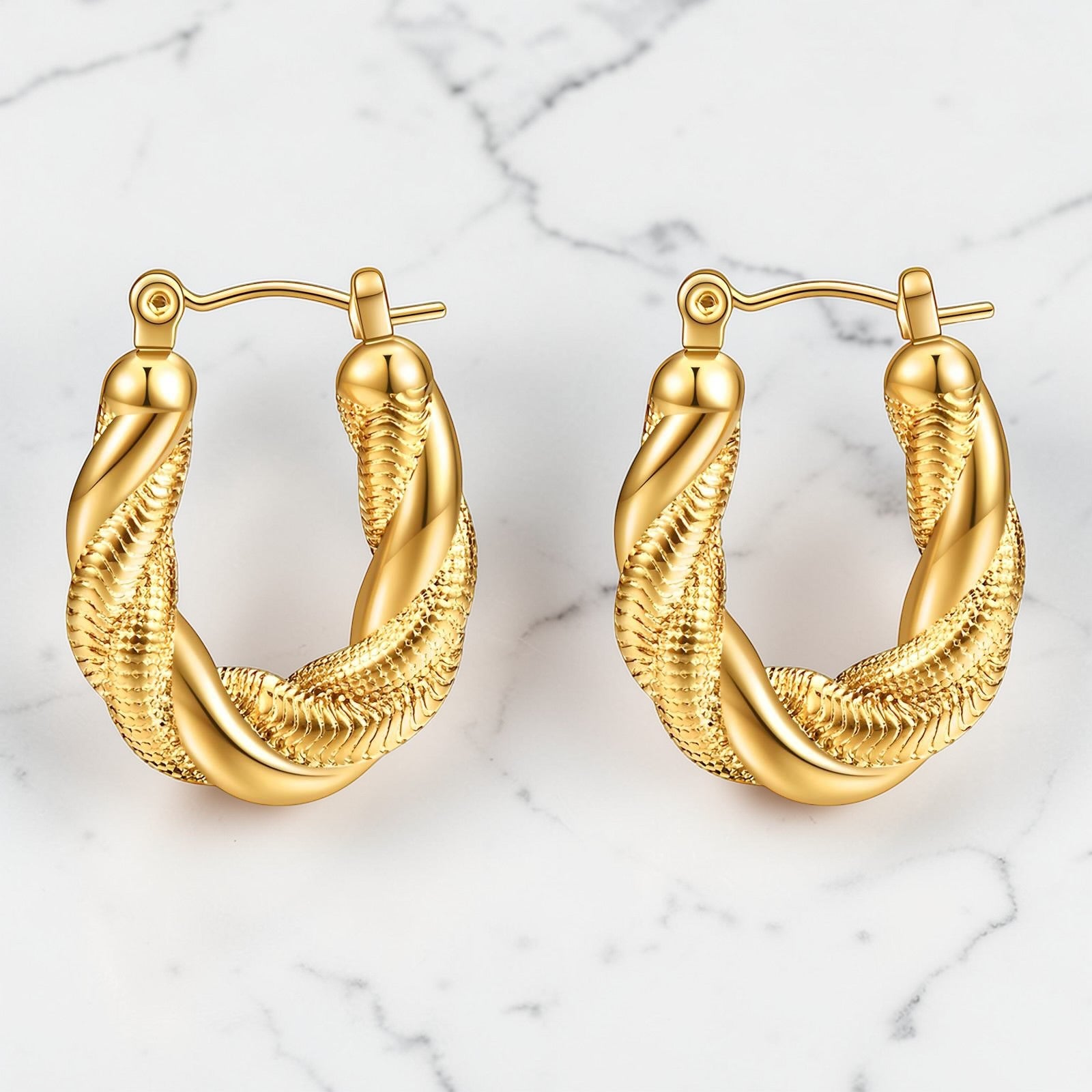 Gold twisted rope hoop earrings with textured detailing and hinged closure