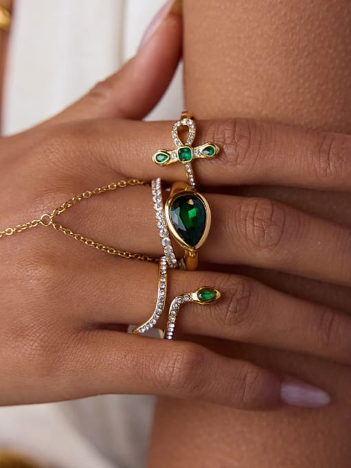 Emerald Mirage Ring with emerald green stone in gold finish, waterproof statement ring by Rayka & Co.