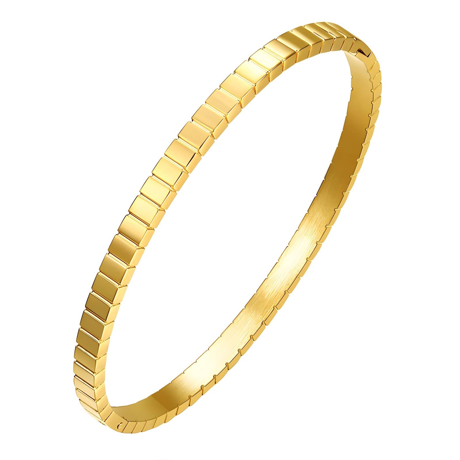 Gold textured bangle with a geometric prism pattern and polished finish.