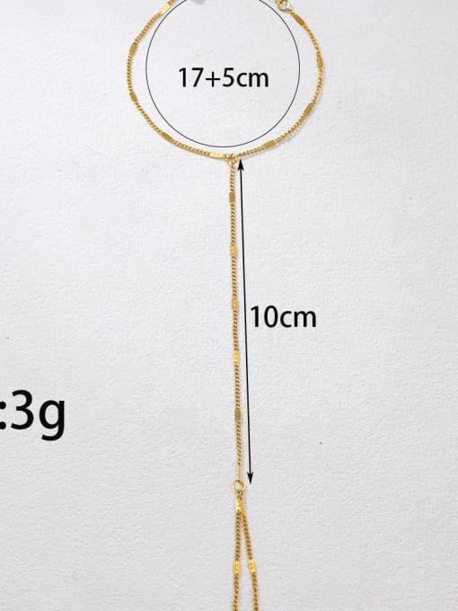 Minimal gold Mira handchain with delicate chain connecting wrist bracelet to finger loop by Rayka & Co.