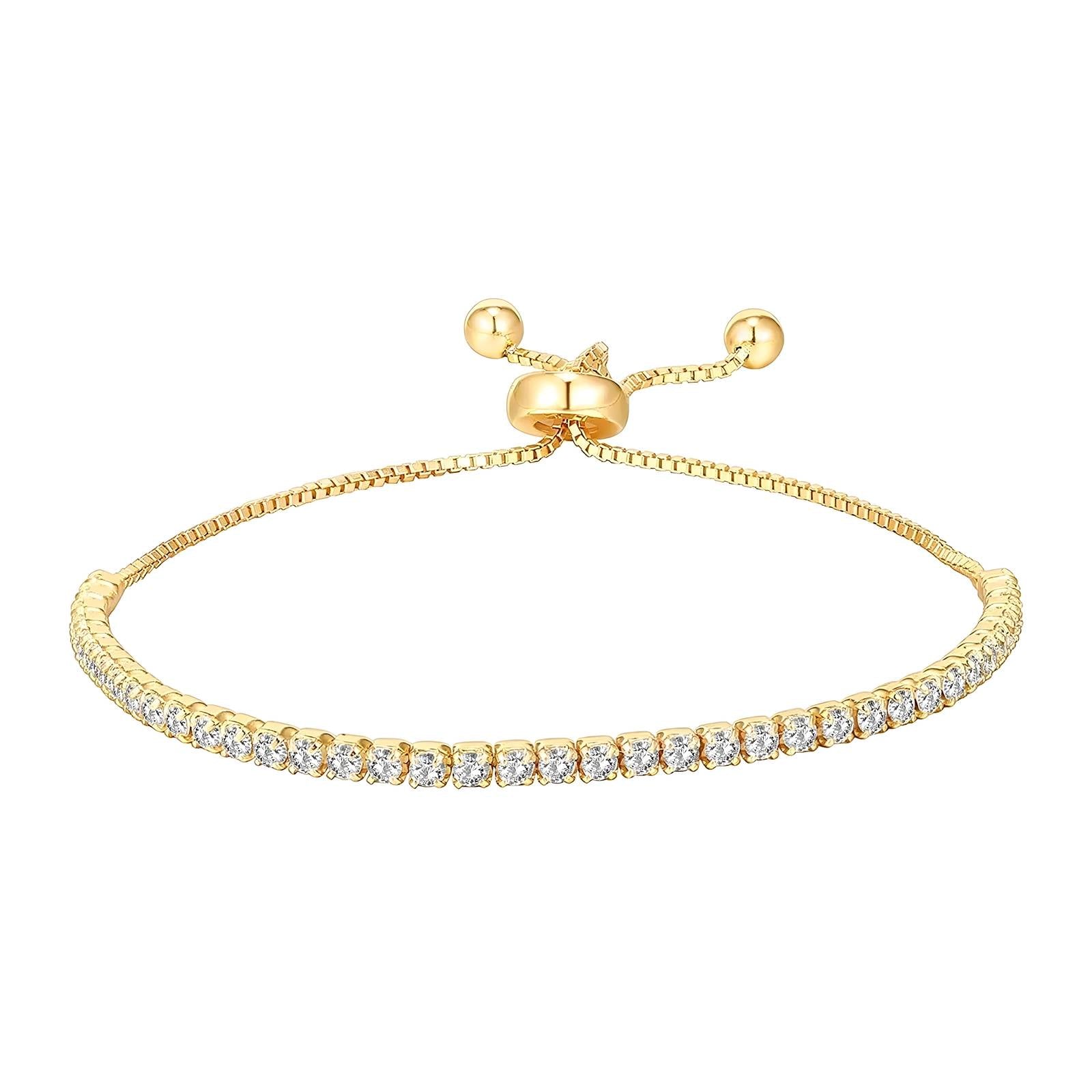 Gold adjustable bracelet with a slim row of clear crystals set along the chain