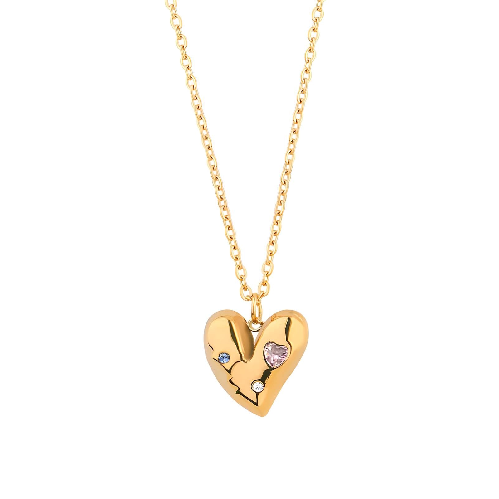 Gold heart necklace with subtle crystal accents on a fine gold chain