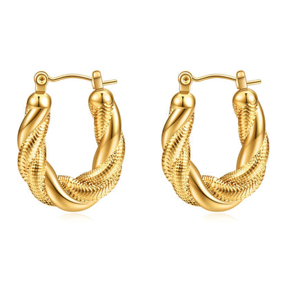 Gold twisted rope hoop earrings with textured detailing and hinged closure